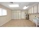 This utility room offers ample storage space at 12418 W Galaxy Dr, Sun City West, AZ 85375