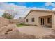 Backyard showing both a covered patio and a secondary seating area with low-maintenance landscaping at 12530 W Jackson St, Avondale, AZ 85323