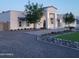 Striking modern home exterior with manicured landscaping, elegant lighting, and well-maintained curb appeal at 13613 N 76Th St, Scottsdale, AZ 85260