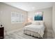 Bright bedroom featuring a white bed, modern decorations, and a minimalist style at 13613 N 76Th St, Scottsdale, AZ 85260