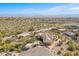 A high aerial view of the estate home nestled in the Arizona desert landscape at 15241 E Pageland Cir, Fountain Hills, AZ 85268