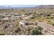 Stunning aerial view of a custom home nestled in the Arizona desert landscape with mountain views at 15241 E Pageland Cir, Fountain Hills, AZ 85268