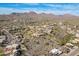 Expansive aerial view capturing a luxury desert community with custom homes and mountain backdrops at 15241 E Pageland Cir, Fountain Hills, AZ 85268