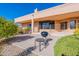 Landscaped backyard featuring a charming outdoor seating area and desert vegetation at 15241 E Pageland Cir, Fountain Hills, AZ 85268