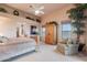 Serene bedroom features a vaulted ceiling, a sitting area, and views from two windows at 15241 E Pageland Cir, Fountain Hills, AZ 85268