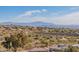 A distant view of the community nestled among the Arizona desert landscape at 15241 E Pageland Cir, Fountain Hills, AZ 85268