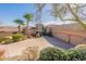 Stunning home featuring desert landscaping, barrel tile roof and circular driveway leading to a three car garage at 15241 E Pageland Cir, Fountain Hills, AZ 85268