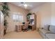 Bright home office features a built-in desk, shutters, and neutral decor at 15241 E Pageland Cir, Fountain Hills, AZ 85268