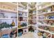 Organized walk-in pantry featuring ample shelving for storage and easy access at 15241 E Pageland Cir, Fountain Hills, AZ 85268