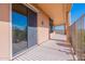 Relaxing covered patio with a seamless transition to the outdoors through sliding glass doors at 15241 E Pageland Cir, Fountain Hills, AZ 85268