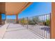 Expansive covered patio with iron railing, offering stunning views of the surrounding landscape at 15241 E Pageland Cir, Fountain Hills, AZ 85268