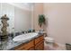 Charming powder room with granite countertop and decorative accents at 15241 E Pageland Cir, Fountain Hills, AZ 85268