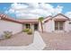 Charming single-story home with a desert landscape, tile roof and a two car garage at 15525 W Clear Canyon Dr, Surprise, AZ 85374