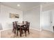 Dining area with dining table, six chairs and artwork on the wall at 16013 S Desert Foothills Pkwy # 2082, Phoenix, AZ 85048