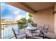 Inviting patio featuring a table with chairs and views of the water at 16013 S Desert Foothills Pkwy # 2082, Phoenix, AZ 85048