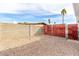 Low-maintenance backyard featuring a block wall and gated access, perfect for privacy at 1640 W Charleston Ave, Phoenix, AZ 85023