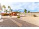 Spacious backyard featuring a rock ground cover and an outdoor bar at 1640 W Charleston Ave, Phoenix, AZ 85023