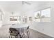 Bright living room features neutral color palette, ceiling fan, and windows providing plenty of natural light at 1640 W Charleston Ave, Phoenix, AZ 85023