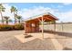 Outdoor patio with brick accents, equipped with bar and seating, surrounded by desert landscaping at 1640 W Charleston Ave, Phoenix, AZ 85023