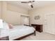 Bedroom with a ceiling fan and door leading to the outside at 16811 S 11Th Way, Phoenix, AZ 85048