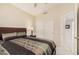 Bedroom with carpet, ceiling fan, and sliding door closet at 16811 S 11Th Way, Phoenix, AZ 85048