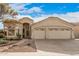 Inviting single-story home features a well-manicured front yard, a two-car garage, and a charming entrance at 16811 S 11Th Way, Phoenix, AZ 85048