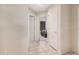 Hallway with tiled floor leading to bedroom at 16811 S 11Th Way, Phoenix, AZ 85048