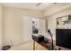 Home office featuring french doors and a glimpse into the adjacent dining room at 16811 S 11Th Way, Phoenix, AZ 85048