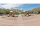 Community playground with slides, swings, and climbing structures for Gathering fun at 18282 N 92Nd St, Scottsdale, AZ 85255