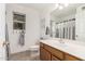 Bright bathroom with white fixtures, tile floor and window light at 18421 N 12Th Way, Phoenix, AZ 85022