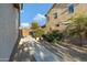 Well-maintained side yard with plants and gravel landscaping at 19025 E Raven Dr, Queen Creek, AZ 85142