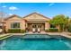 Sparkling backyard pool and patio area offers a relaxing outdoor living experience at 20551 E Mayberry Rd, Queen Creek, AZ 85142