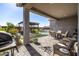 Outdoor patio area with a barbecue, pergola, seating area, and a view of the pool at 21413 N 59Th St, Phoenix, AZ 85054