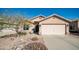 Charming single-story home featuring desert landscaping and a two-car garage at 24431 N 35Th Dr, Glendale, AZ 85310