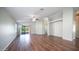 Open-concept living room with hardwood floors and lots of natural light at 24431 N 35Th Dr, Glendale, AZ 85310