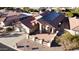 Beautiful view of a single-story home with solar panels and a well-kept roof at 26637 S New Town Dr, Sun Lakes, AZ 85248