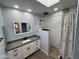 Updated bathroom featuring granite countertops, modern fixtures, and tiled shower at 26637 S New Town Dr, Sun Lakes, AZ 85248