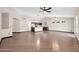 Spacious living room featuring hardwood floors, high ceilings, and an open floor plan at 318 E Gail Dr, Gilbert, AZ 85296