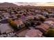 Expansive aerial view showcases the home's beautiful location in a vibrant community with mountain views at 3274 E Isaiah Ct, Gilbert, AZ 85298