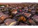 A picturesque aerial view of a home with a backyard oasis including pool, spa, and mature landscaping at 3274 E Isaiah Ct, Gilbert, AZ 85298