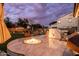 Outdoor area showcasing a stainless BBQ, a fire pit, and a cozy gazebo, ideal for relaxing evenings outdoors at 3274 E Isaiah Ct, Gilbert, AZ 85298