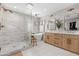 Bright bathroom with separate tub and glass shower and double sink vanity at 3274 E Isaiah Ct, Gilbert, AZ 85298