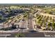 Aerial view of the neighborhood entrance, featuring manicured landscaping and decorative signage at 3274 E Isaiah Ct, Gilbert, AZ 85298