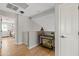 Hallway featuring wood floors, white walls and doors and entry to bedroom at 3274 E Isaiah Ct, Gilbert, AZ 85298