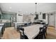 Spacious kitchen adjacent to a dining area, featuring stainless steel appliances and an open layout at 3274 E Isaiah Ct, Gilbert, AZ 85298