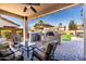 Inviting outdoor kitchen with a built-in grill and comfortable seating, perfect for entertaining guests in style and comfort at 3274 E Isaiah Ct, Gilbert, AZ 85298