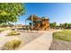 Neighborhood playground featuring shaded play structures, benches and walking paths at 3274 E Isaiah Ct, Gilbert, AZ 85298