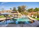 Enjoy the sparkling swimming pool with a relaxing water feature, perfect for cooling off on warm days at 3274 E Isaiah Ct, Gilbert, AZ 85298