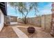 The backyard is partially xeriscaped, with an enclosed patio at 4022 W Kaler Dr, Phoenix, AZ 85051