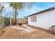 The xeriscaped backyard features a block perimeter wall and side entry at 4022 W Kaler Dr, Phoenix, AZ 85051